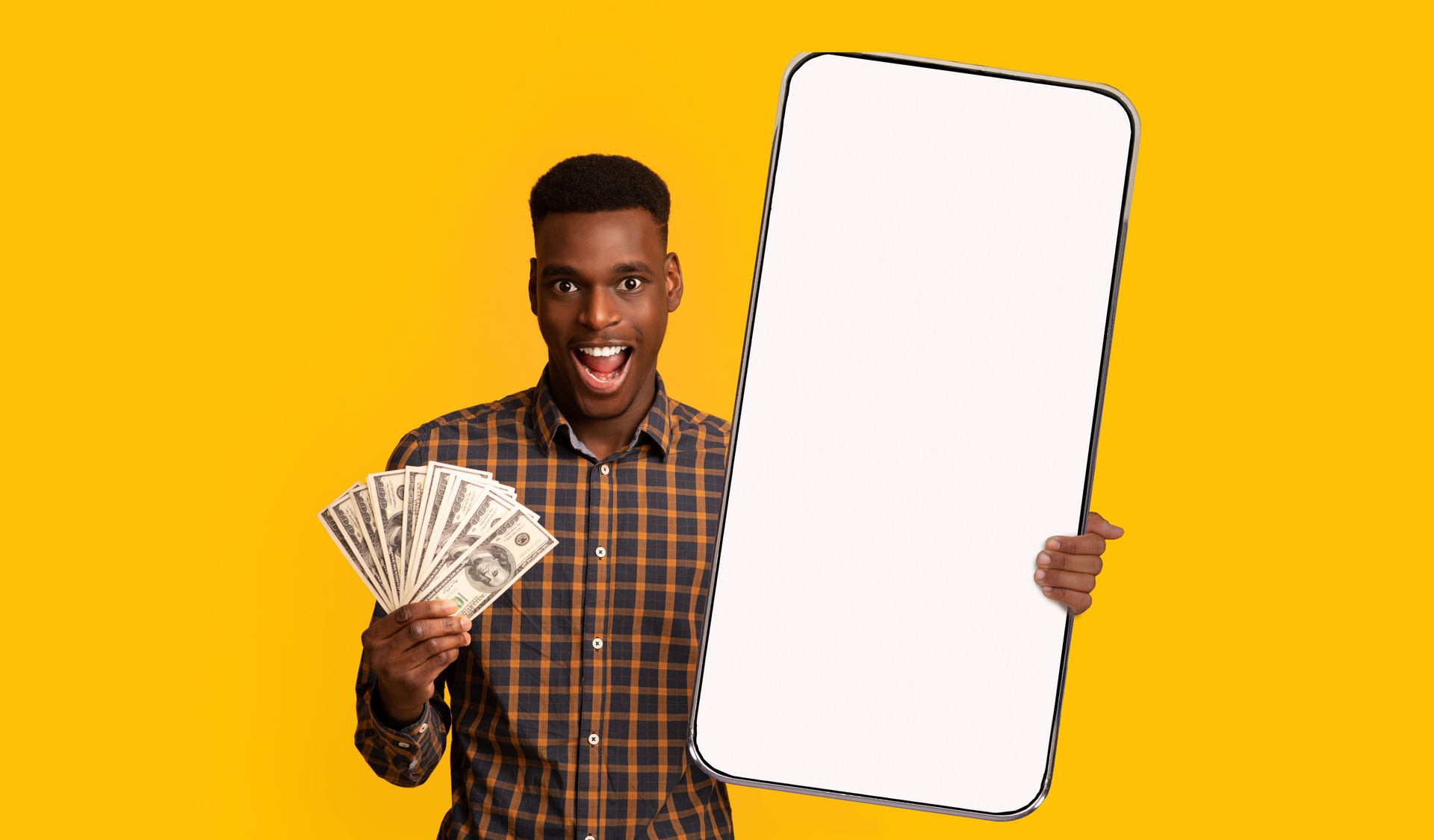 Black guy holding mobey and big white empty smartphone screen